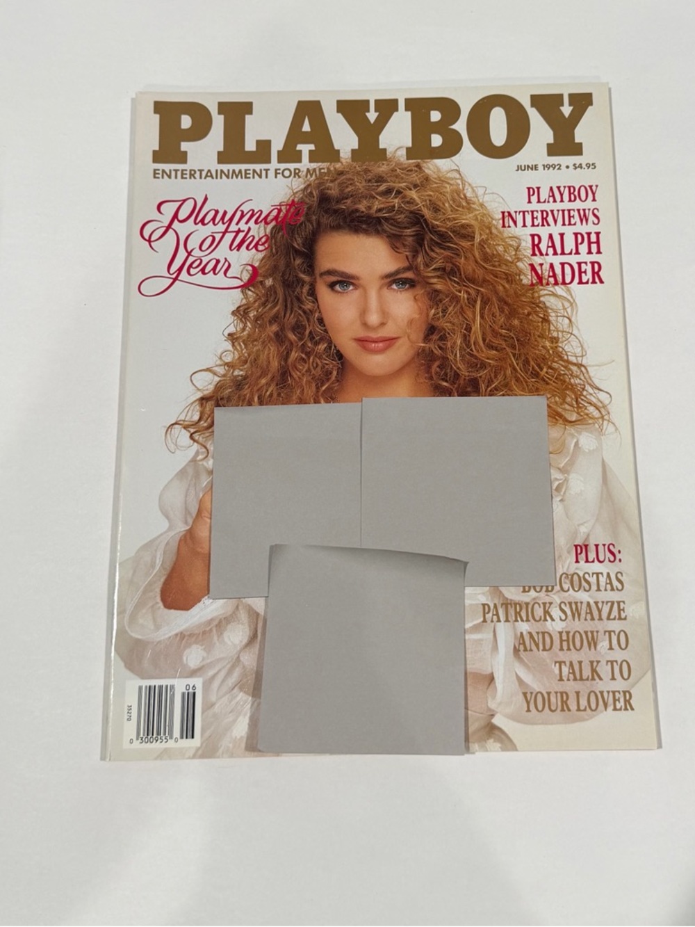 PLAYBOY magazine with red Budweiser ad and brown horse imagery